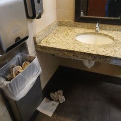 Bob Evans - Trash on mens bathroom floor