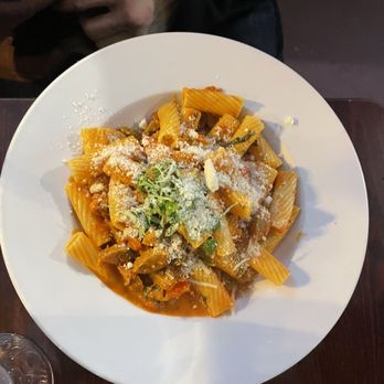 The Cask - Rigatoni Salsiccia pasta tossed with Italian sausage, fresh herbs, roasted bell pepper light cream marinara sauce and parmesan cheese - Wine Bars Near Me - San Carlos, California The Cask - Rigatoni Salsiccia pasta tossed with Italian sausage, fresh herbs, roasted bell pepper light cream marinara sauce and parmesan cheese - Wine Bars Near Me - San Carlos, California