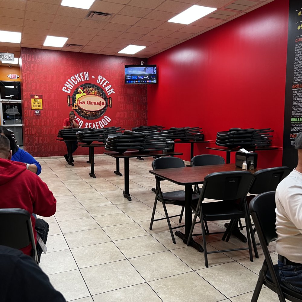 La Granja - people sitting at tables in a restaurant - Latin American Near Me - Kissimmee, Florida La Granja - people sitting at tables in a restaurant - Latin American Near Me - Kissimmee, Florida