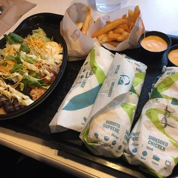 Taco Bell - L-R Vegetarian Catina Bowl, Nacho Fries with Cheese Sauce, 2 of the 7 Layer Burritos and 1 Bean Burrito. About $17 in total - Fast Food Near Me - Niagara Falls, New York Taco Bell - L-R Vegetarian Catina Bowl, Nacho Fries with Cheese Sauce, 2 of the 7 Layer Burritos and 1 Bean Burrito. About $17 in total - Fast Food Near Me - Niagara Falls, New York