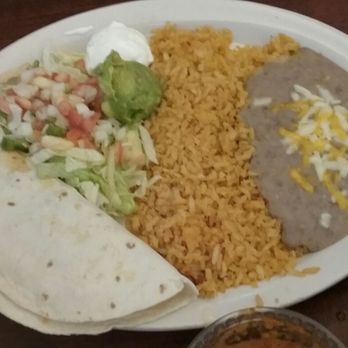 Los Compadres Cafe - Beef quesadilla lunch. $7.25! Comes with sour cream AND  guacmole. - Mexican Near Me - Norman, Oklahoma