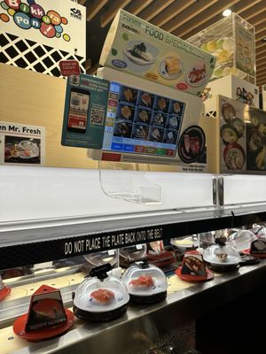 Kura Revolving Sushi Bar by null