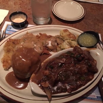 The Roxy Supper Club - Jagerschnitzel (left - breaded pork) and Liechtenstein Casseole (the bowl on the right). Great food!! - Supper Clubs Near Me - Oshkosh, Wisconsin