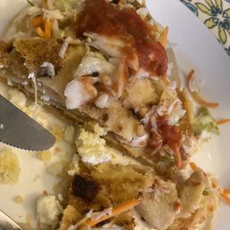 Pardon the picture I was hungry! This is a "mixta/mixed" pupusa. It has beans, cheese and pork.