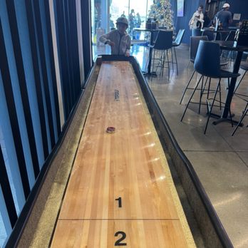Topgolf - Jr on the shuffle board - Golf Near Me - El Segundo, California