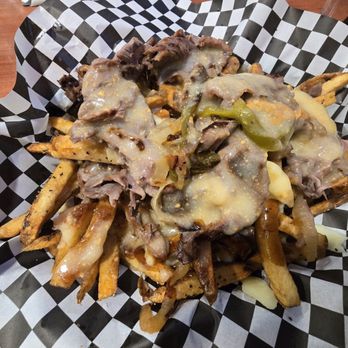 Tapp's Neighbourhood Pub - Cheesesteak Poutine - Pubs Near Me - Winnipeg, Manitoba Tapp's Neighbourhood Pub - Cheesesteak Poutine - Pubs Near Me - Winnipeg, Manitoba