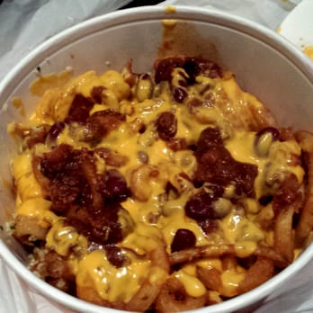 PT's Gold - A must have! Garlic chili cheese curly fries! Best late night cheat meal - Sports Bars Near Me - Las Vegas, Nevada PT's Gold - A must have! Garlic chili cheese curly fries! Best late night cheat meal - Sports Bars Near Me - Las Vegas, Nevada