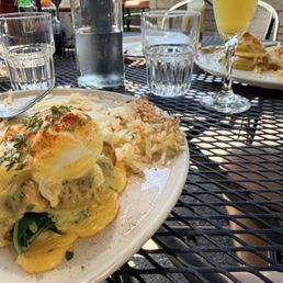 Crab cake Benedict and Mimosa Crab cake Benedict and Mimosa