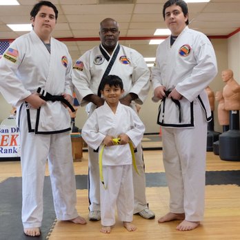 Sidekicks Martial Arts Academy - Grandmaster Orange, Black belt and yellow belt. - Self-defense Classes Near Me - San Diego, California Sidekicks Martial Arts Academy - Grandmaster Orange, Black belt and yellow belt. - Self-defense Classes Near Me - San Diego, California