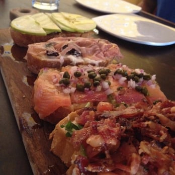 Postino Annex - Bruschetta Board: green apple and brie, prosciutto with figs, salmon with capers, burata and bacon - Wine Bars Near Me - Tempe, Arizona Postino Annex - Bruschetta Board: green apple and brie, prosciutto with figs, salmon with capers, burata and bacon - Wine Bars Near Me - Tempe, Arizona