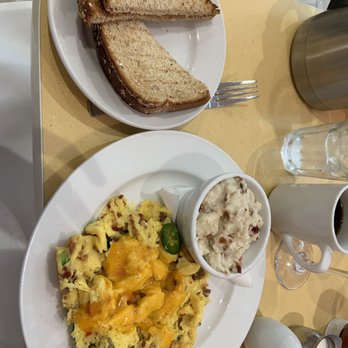 Wild Eggs - Build-your-own Egg Scramble with cheddar bacon grits. - Breakfast & Brunch Near Me - Indianapolis, Indiana Wild Eggs - Build-your-own Egg Scramble with cheddar bacon grits. - Breakfast & Brunch Near Me - Indianapolis, Indiana