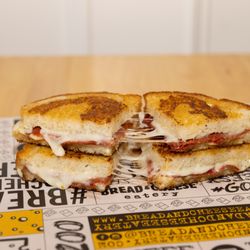 Bread and Cheese Eatery - Pizza-Grill-Zoni - Melty Provolone and Pepperoni on Parmesan Marinara Grilled Sourdough