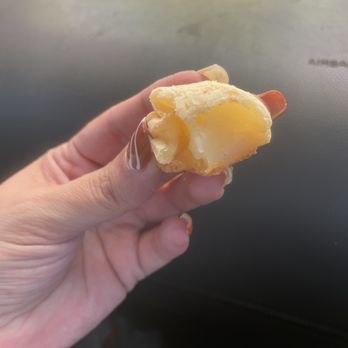 Remembr Store - Pao de Queijo (cheese bread) sorry half eaten, but couldn't wait... hot and the cheesy soft center OMG - Brazilian Near Me - Sunrise, Florida