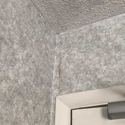 Peeling, water damaged walls
