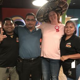 A photo of myself with restaurant members and staff A photo of myself with restaurant members and staff