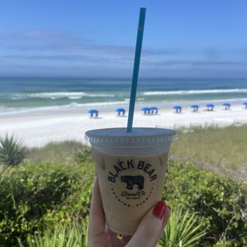 Black Bear Bread - Sipping my iced vanilla latte at the beach across the street - Bakeries Near Me - Santa Rosa Beach, Florida