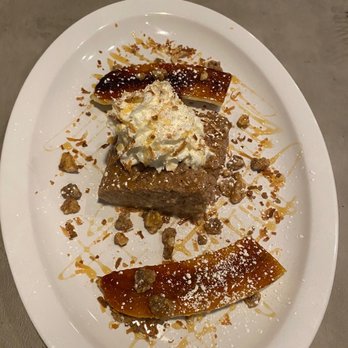 Zest - a plate of food on a table - New American Near Me - Bay Shore, New York Zest - a plate of food on a table - New American Near Me - Bay Shore, New York