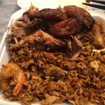 Lechonera Latina #3 - a plate of rice and meat - Latin American Near Me - Orlando, Florida Lechonera Latina #3 - a plate of rice and meat - Latin American Near Me - Orlando, Florida