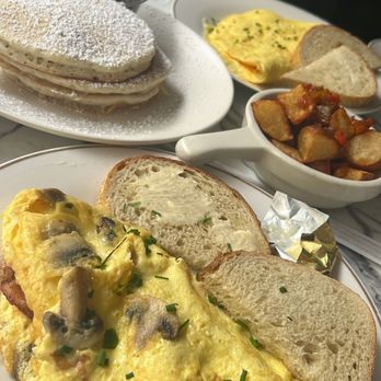 Fiore - Omelet with bacon and mushroom Plain Pancake Home Fries - New American Near Me - Miami, Florida Fiore - Omelet with bacon and mushroom Plain Pancake Home Fries - New American Near Me - Miami, Florida