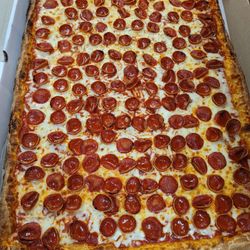 Romano’s Pizza Cafe - 32 cut party tray