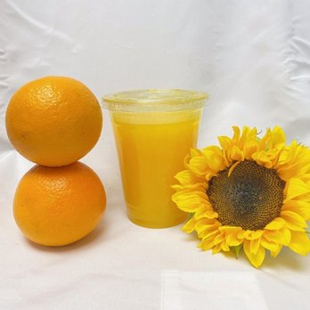 Route 650 Cafe - a sunflower, oranges, and a glass of orange juice - Coffee & Tea Near Me - Beverly Hills, California Route 650 Cafe - a sunflower, oranges, and a glass of orange juice - Coffee & Tea Near Me - Beverly Hills, California