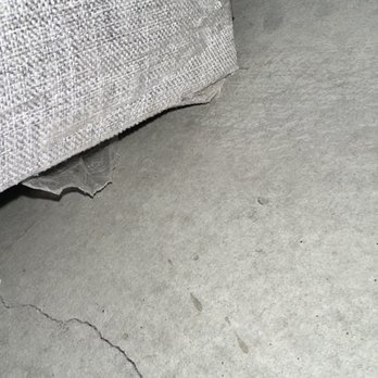 Grizzly Moving & Storage - Another rip on the couch from being dragged on the floor - Movers Near Me - San Diego, California