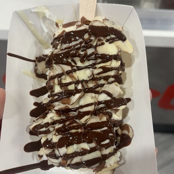 The Paleta Bar - coconut bar dipped in white chocolate, topped with almonds and coconut, drizzled with dark chocolate. - Desserts Near Me - Mesa, Arizona