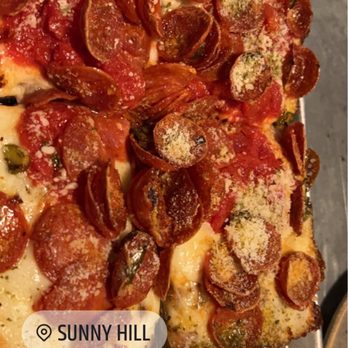 Sunny Hill - Pepperoni with pickled Serrano peppers you can't taste and a side of hot honey ($2?!) which was frankly what made the pizza better imo! - Pizza Near Me - Seattle, Washington