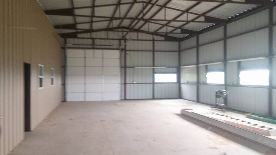 Slide of Hackett's Custom Siding and Metal Roofs