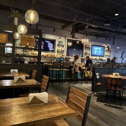 Baker Street Burgers - From back of restaurant - seated half booth and table