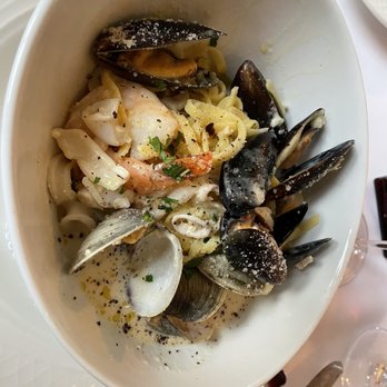 Magnolia Inn & Restaurant - Frutti de Mare - flavorful with just the right amount of seasoning to enhance the taste of the mussels, clams, calamari, and shrimp. - Hotels Near Me - Pinehurst, North Carolina Magnolia Inn & Restaurant - Frutti de Mare - flavorful with just the right amount of seasoning to enhance the taste of the mussels, clams, calamari, and shrimp. - Hotels Near Me - Pinehurst, North Carolina