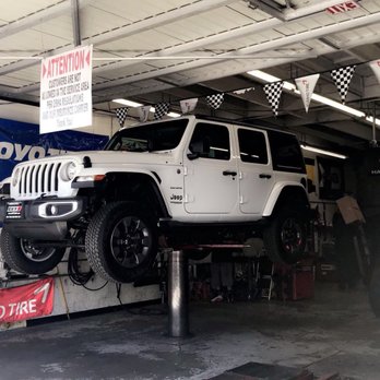 Tires & Wheels Unlimited - Up she goes - Tires Near Me - Whittier, California Tires & Wheels Unlimited - Up she goes - Tires Near Me - Whittier, California