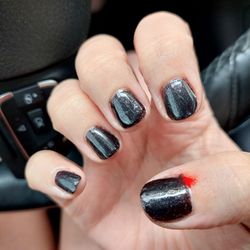 Galaxy Nail's And Spa - Hard to capture the lumpy polish in a photo, but not hard to capture the cuticle cut.