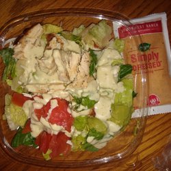 Wendy's - This is my large salad. $8 with tax. Where is my bacon and my other scoop of guacamole? I won't be back.