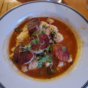 Hooked - Scallops in a beer broth over cheddar grits - Seafood Near Me - Ocean City, Maryland Hooked - Scallops in a beer broth over cheddar grits - Seafood Near Me - Ocean City, Maryland