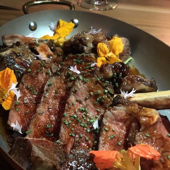 Monarch Restaurant - The Tomahawk steak, cooked to absolute perfection. - Steakhouses Near Me - Omaha, Nebraska Monarch Restaurant - The Tomahawk steak, cooked to absolute perfection. - Steakhouses Near Me - Omaha, Nebraska