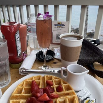 Island Lava Java - Waffle with strawberries and pomegranate mimosa - American Near Me - Kailua Kona, Hawaii