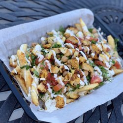 Taste Mediterranean Grill - Come soon to our menu - Taste Mediterranean loaded fries with chicken, dill yogurt sauce and green chutney