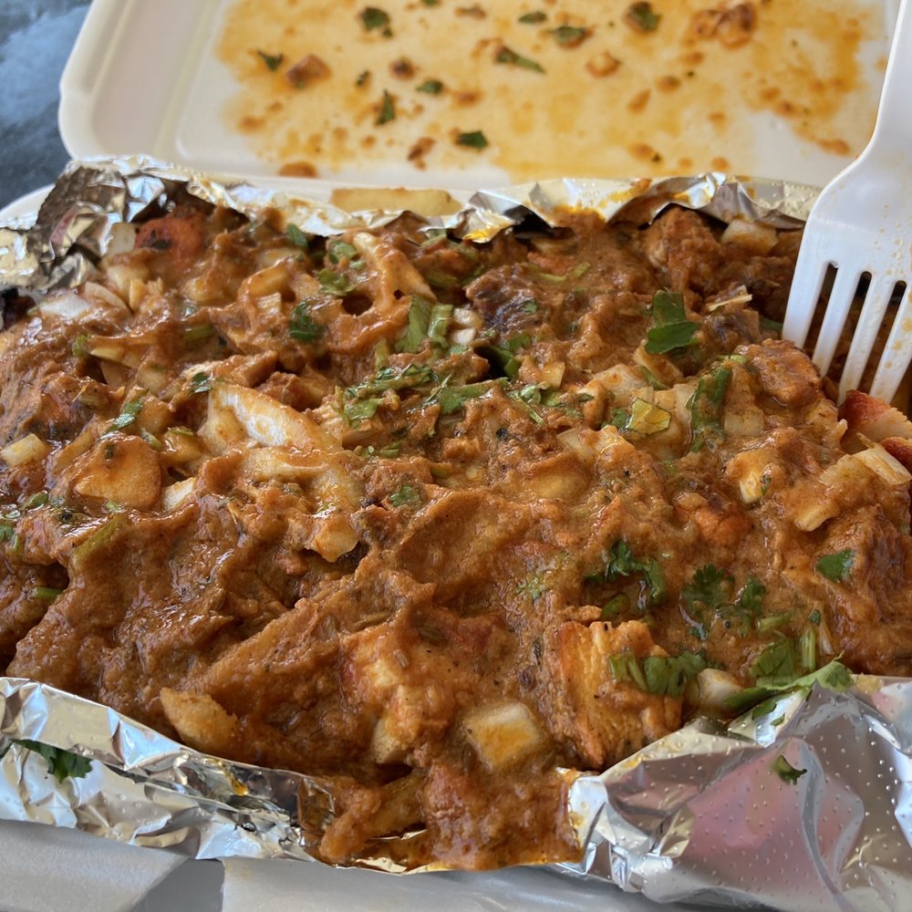King's Grill - a plate of food and a fork - Indian Near Me - Hollywood,, Florida King's Grill - a plate of food and a fork - Indian Near Me - Hollywood,, Florida
