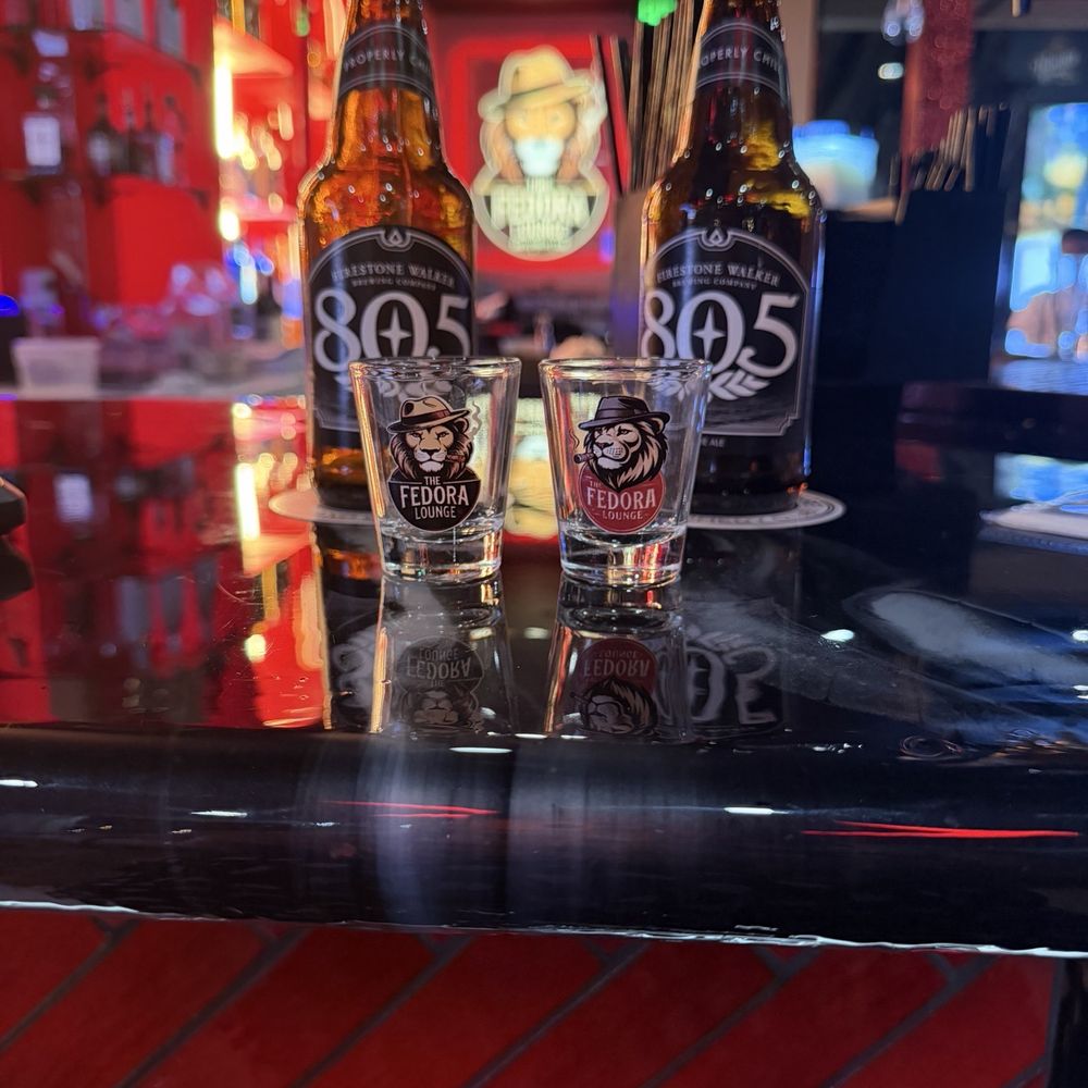 The Fedora Lounge & Comedy Club - Bar, 805, shot glasses and signs - Comedy Clubs Near Me - Suisun City, California The Fedora Lounge & Comedy Club - Bar, 805, shot glasses and signs - Comedy Clubs Near Me - Suisun City, California