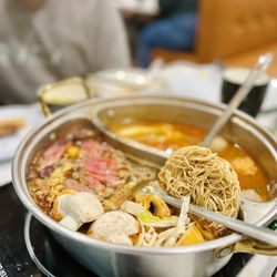 Hanoi Hot Pot - Hot pot with medium spicy Sichuan flavoring and the other half is Thai flavoring.