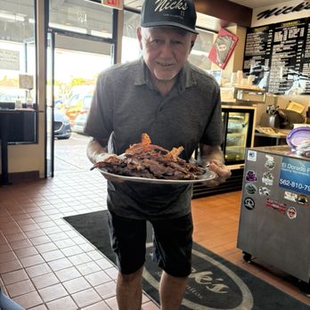 Nick's Deli II - Proud owner Nick showing off REAL bacon, nothing but the best! - Delis Near Me - Los Alamitos, California Nick's Deli II - Proud owner Nick showing off REAL bacon, nothing but the best! - Delis Near Me - Los Alamitos, California