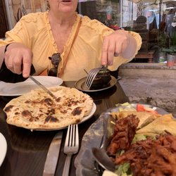 Achiana - Garlic naan, samosas, and bhajis.. and my cousin.