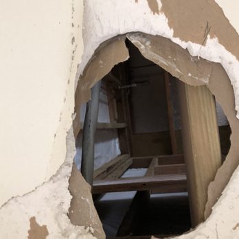 Handy Hawaii - Hole in the exterior of our home where his guys fell through the floor. - General Contractors Near Me