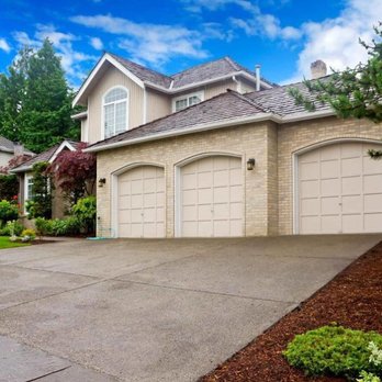 TAB Construction - the front of a home with a large driveway - General Contractors Near Me TAB Construction - the front of a home with a large driveway - General Contractors Near Me