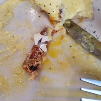 JT's Diner - The egg shells I found in the second benedict....like I said the waiter refunded us for the Benedict on our bill - American Near Me - Palm Desert, California