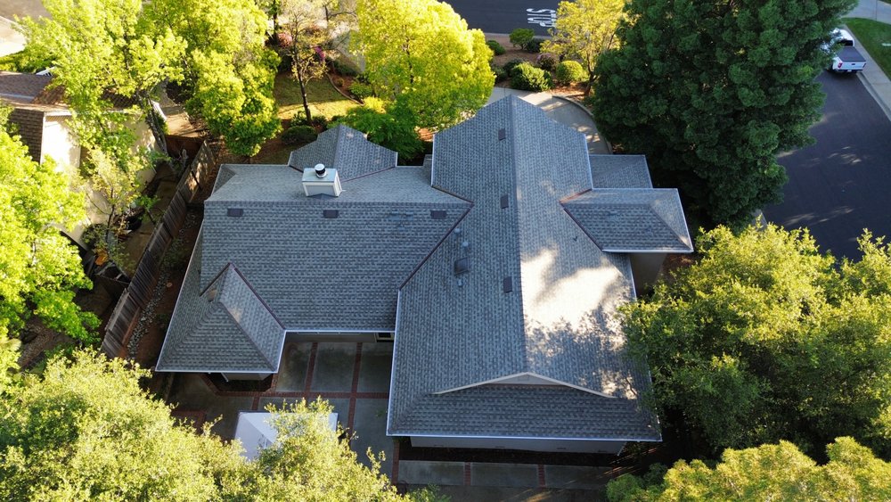Slide of Grizzly Roofing