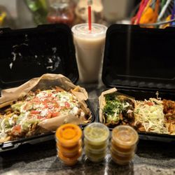 Contodo Fresh Mexican Eats - Pollo Asado Fries (left), Horchata and fresh salsas (middle), Adobado taco and spicy shrimp taco (right)