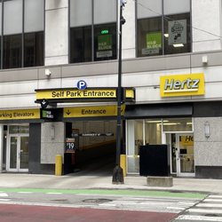 Hertz - Return your car in the parking lot on the left.