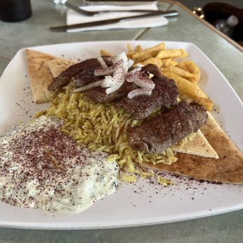 Tiba Grill - Beef plate with rice, cucumber sauce and pita bread - Mediterranean Near Me - Tyler, Texas Tiba Grill - Beef plate with rice, cucumber sauce and pita bread - Mediterranean Near Me - Tyler, Texas